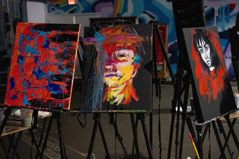 Live paintings on easels at Founders Alley Philadelphia 2025